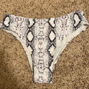 Snakeskin high waisted/high leg bikini bottom. Size small.
